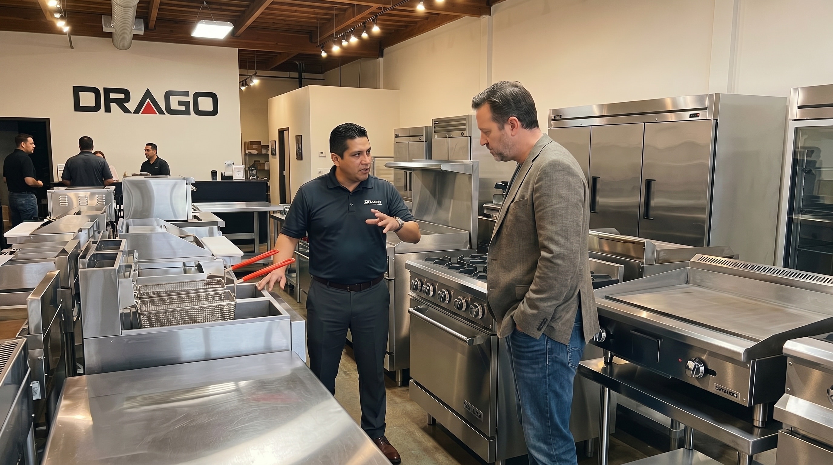 A DRAGO specialist helping a customer choose kitchen equipment